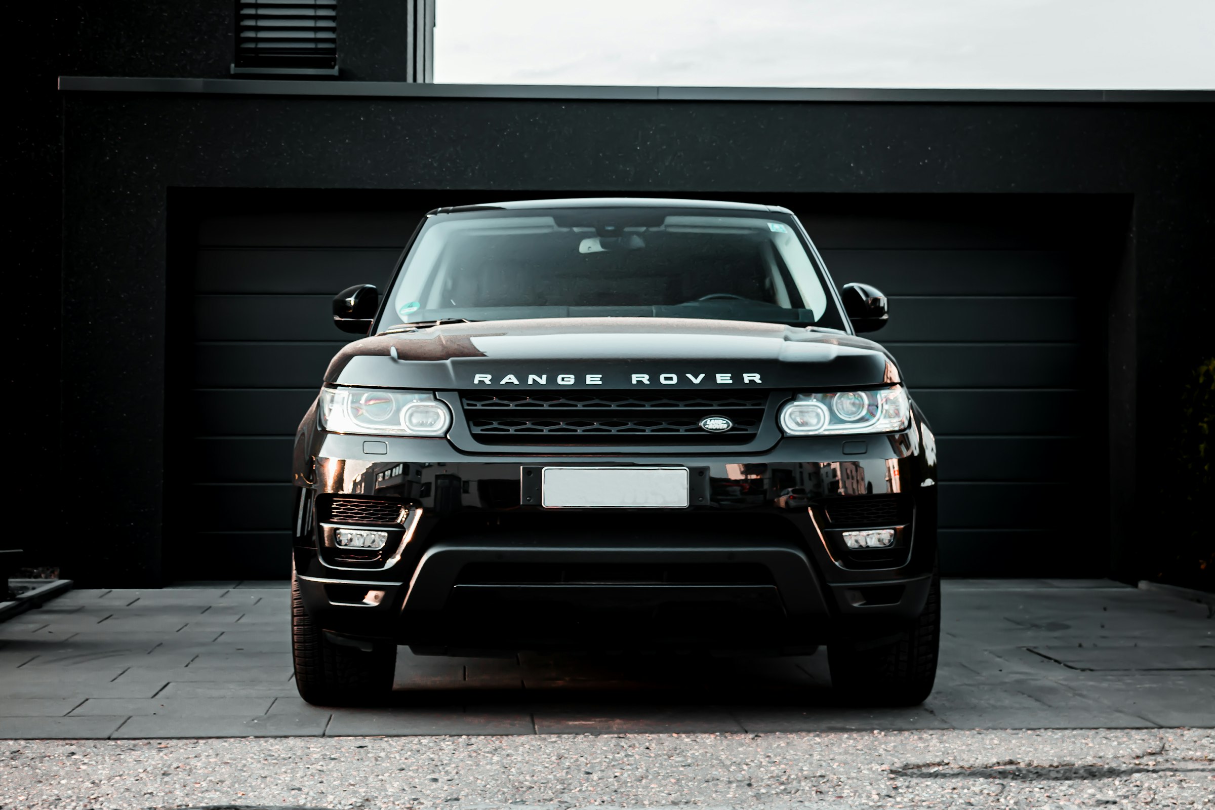 A fleet of vehicles ready for a corporate arrival